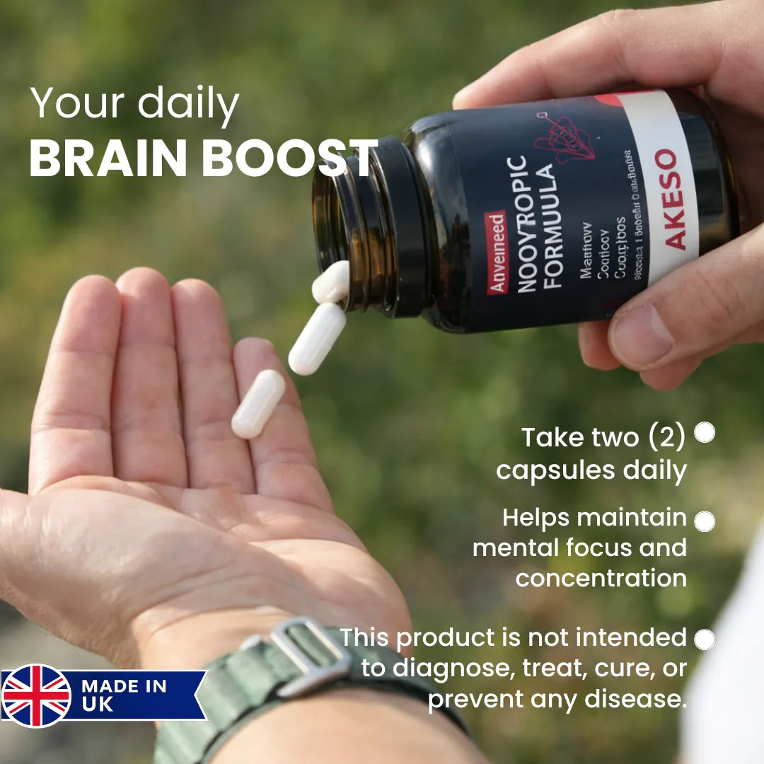 Two Akeso Advanced Nootropic Formula capsules poured into an open hand