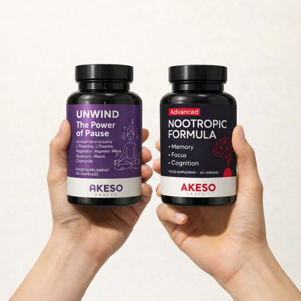 Hands holding Akeso Health UNWIND and Advanced Nootropic Formula bottles