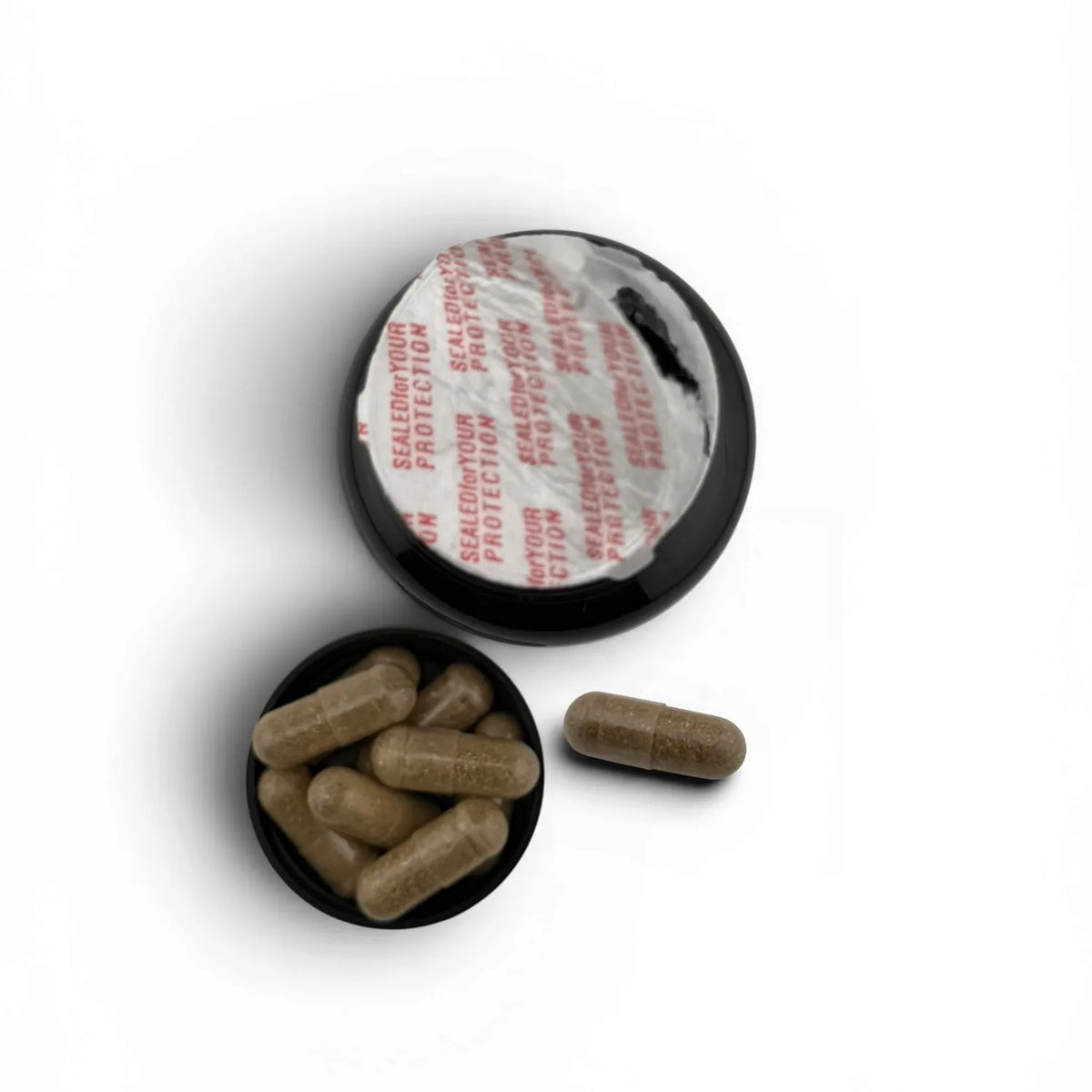Open Akeso Health UNWIND lid with its foil seal and capsules in the cap